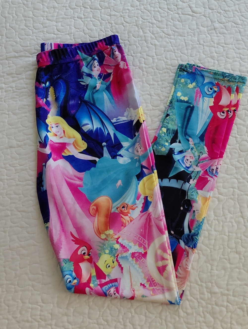 Sleeping Beauty Print Shiny Leggings. NWOT